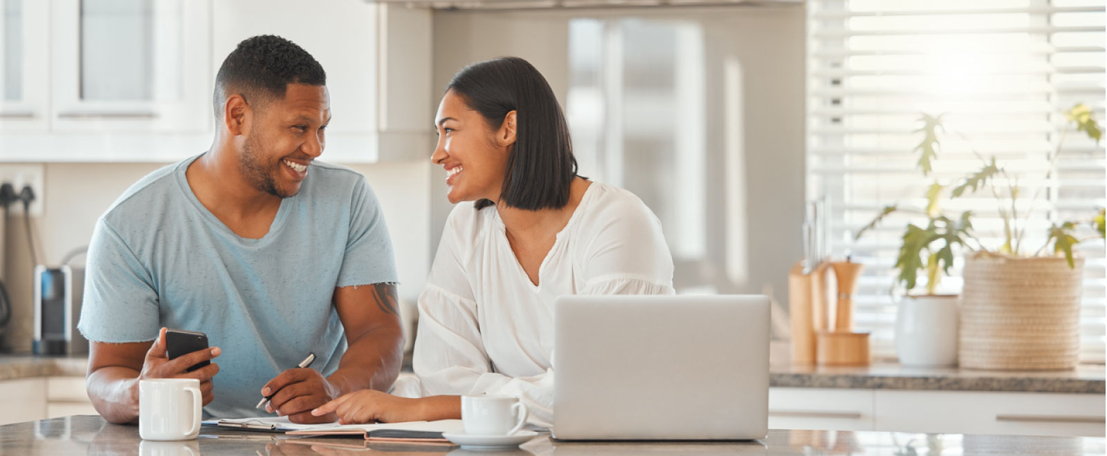 Happy couple applying for a Home Equity Line-of-Credit from KEMBA