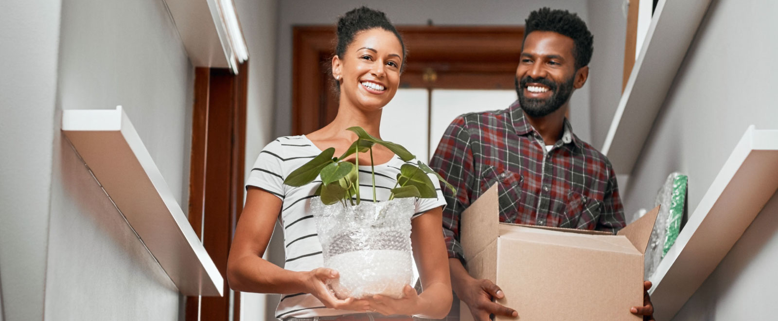 young couple moving into a new home