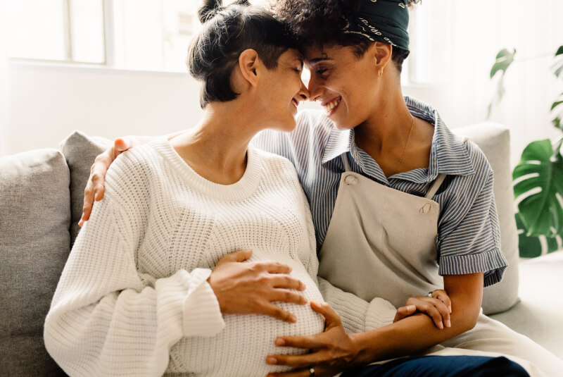 smiling pregnant couple