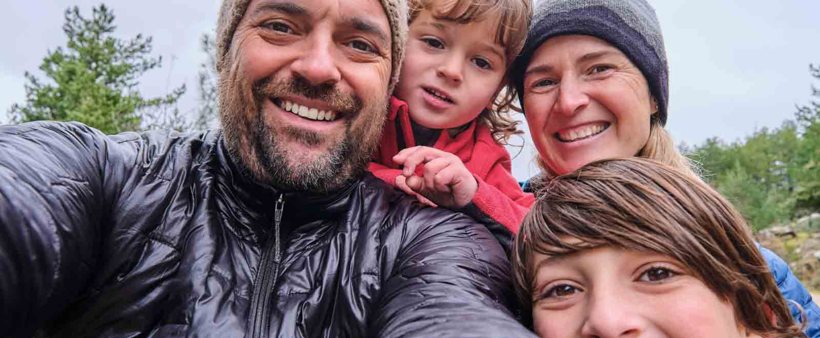 Confident family enjoying the outdoors, reflecting financial peace of mind with a strong money market strategy.