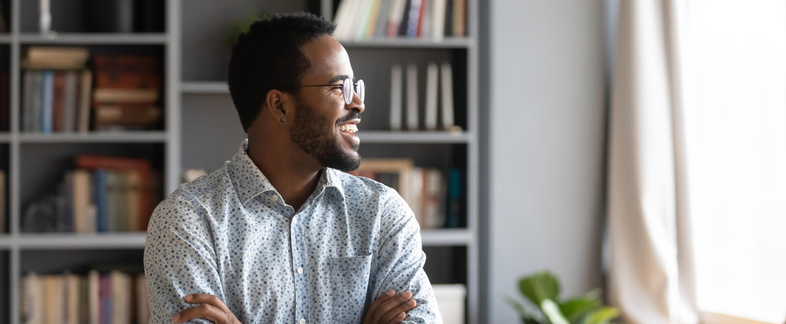 Young confident man sitting in his office.