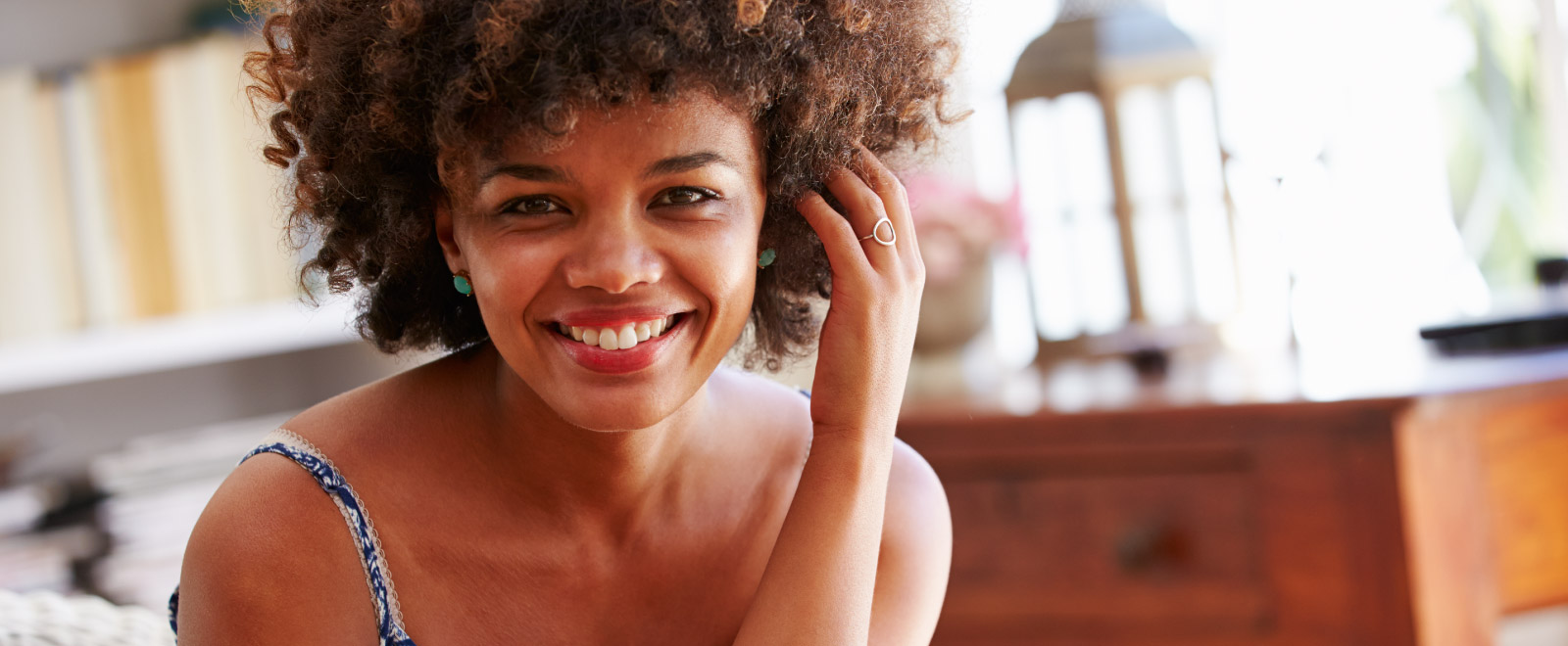 A woman smiling.