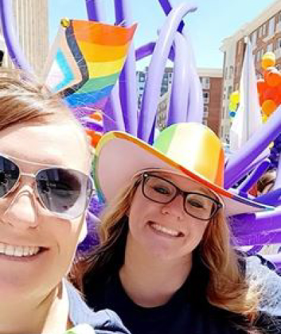 Two women at a parade.