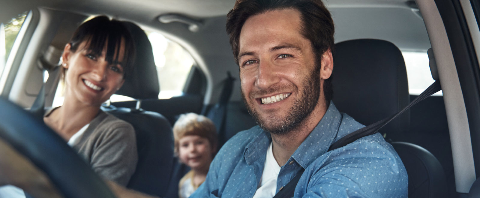 happy family in car