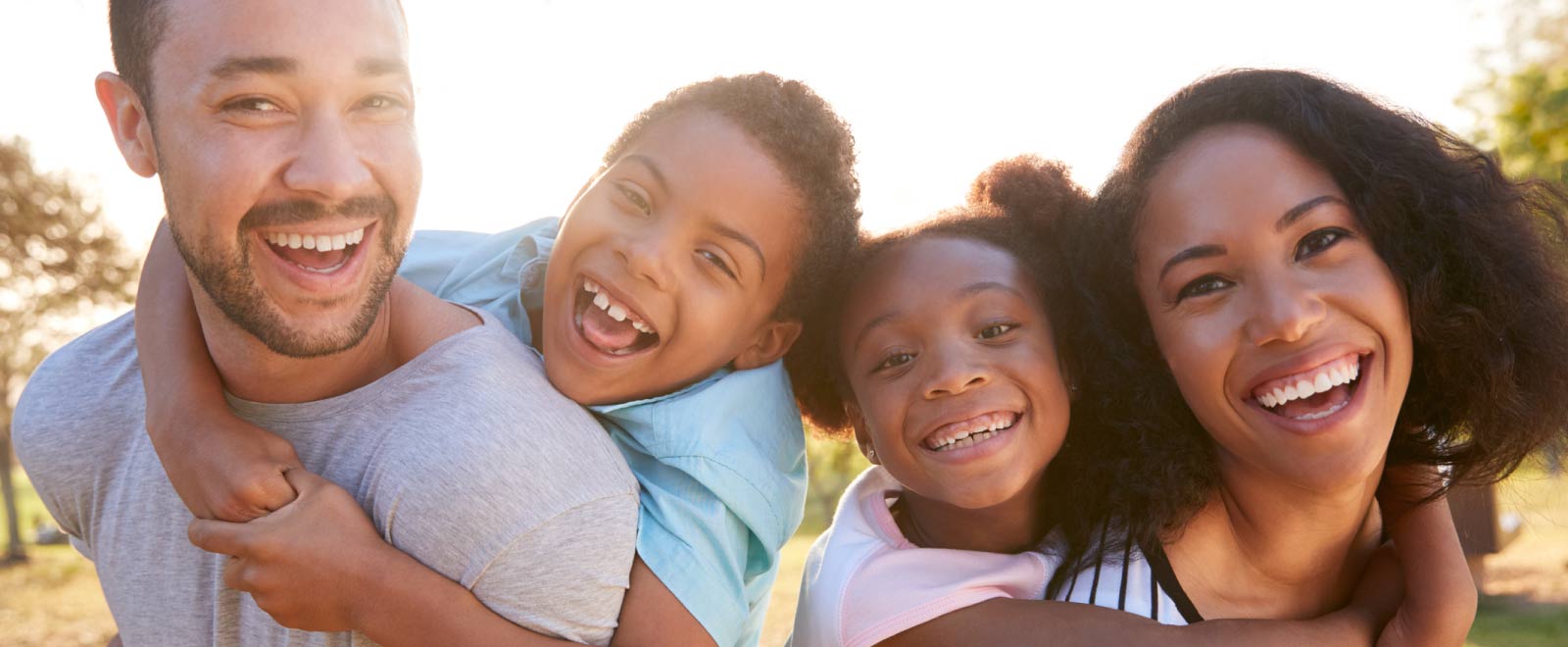 Happy family enjoying summer, earning more savings with a Money Market Account from KEMBA Financial