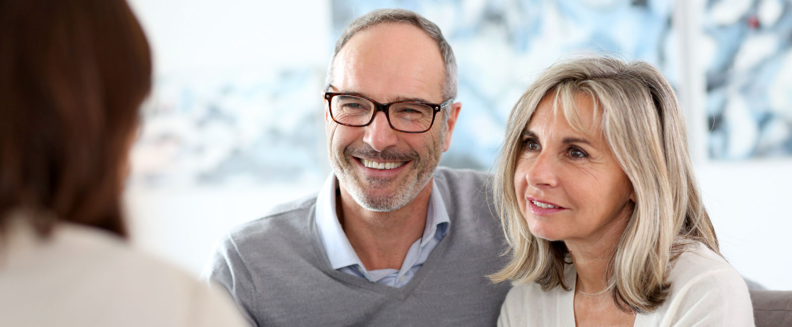 mature couple meeting with expert