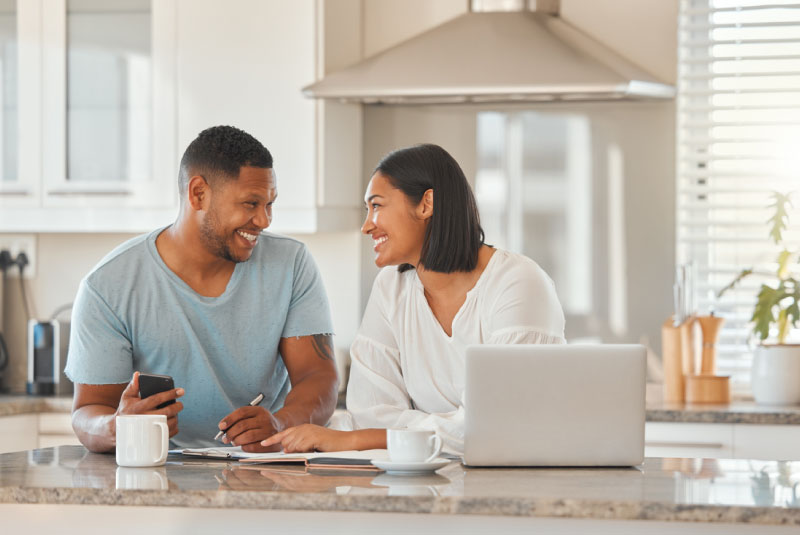 Happy couple applying for a Home Equity Line-of-Credit from KEMBA
