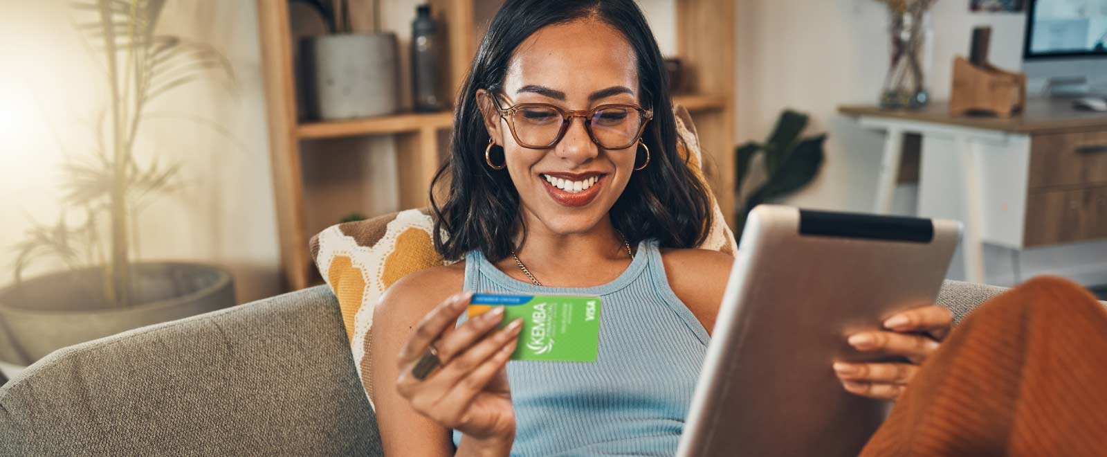 woman online shopping with KEMBA credit card