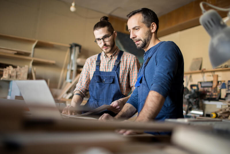 two men working in a workshop