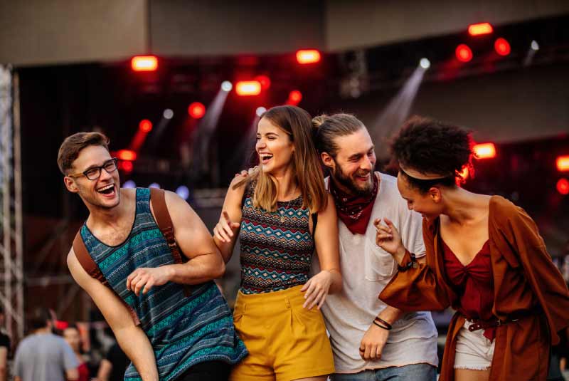 A group of friends enjoying themselves at the KEMBA Live! music venue, showcasing the vibrant atmosphere and exciting performances.
